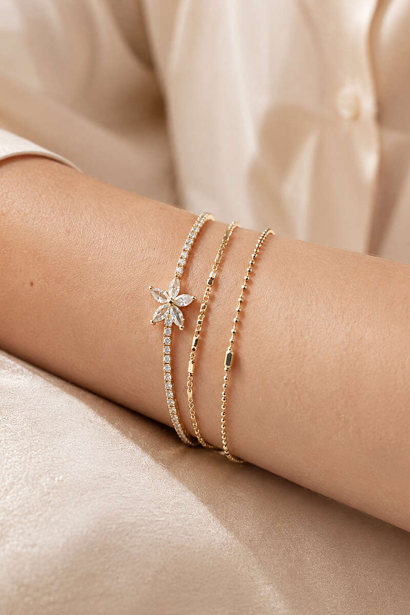 https://cdn.pazarium.com.tr/cicek-zincir-detayli-bileklik-gold-811102-20-B.jpg