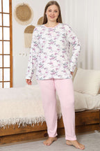 https://cdn.pazarium.com.tr/cicekli-fitilli-buyuk-beden-pijama-takimi-pembe-711618-17-B.jpg