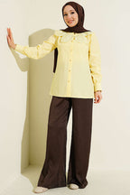 https://cdn.pazarium.com.tr/dantelli-bebe-yakali-poplin-gomlek-sari-795114-19-B.jpg