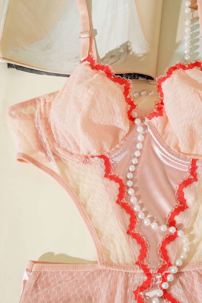 https://cdn.pazarium.com.tr/dantelli-ip-askili-bodysuit-somon-638060-15-B.jpg