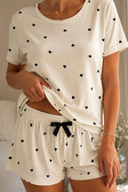 https://cdn.pazarium.com.tr/desenli-bisiklet-yaka-sortlu-pijama-takimi-siyah-802217-19-B.jpg