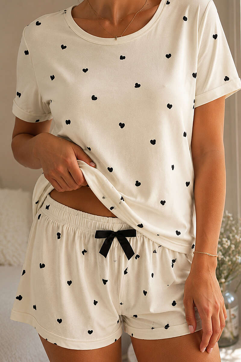 https://cdn.pazarium.com.tr/desenli-bisiklet-yaka-sortlu-pijama-takimi-siyah-802217-19-B.jpg