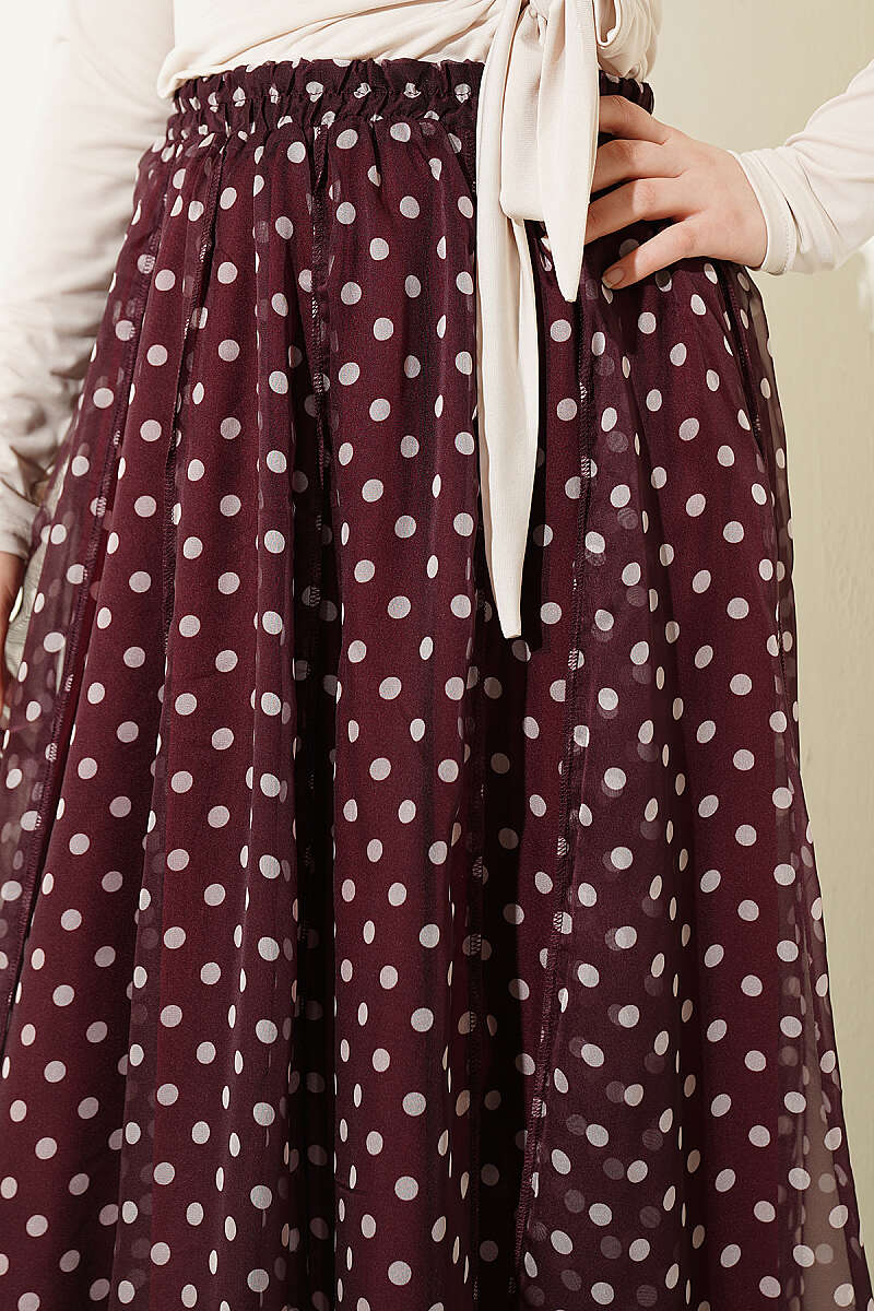 https://cdn.pazarium.com.tr/desenli-dikisli-asimetrik-sifon-etek-bordo-764184-18-B.jpg