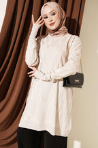 https://cdn.pazarium.com.tr/desenli-gold-dugmeli-merserize-tunik-bej-826022-20-B.jpg