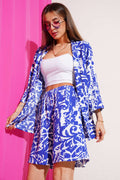 https://cdn.pazarium.com.tr/desenli-sortlu-burumcuk-kimono-takim-saks-624184-15-B.jpg