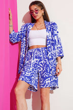 https://cdn.pazarium.com.tr/desenli-sortlu-burumcuk-kimono-takim-saks-624186-15-B.jpg