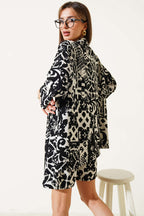 https://cdn.pazarium.com.tr/desenli-sortlu-burumcuk-kimono-takim-siyah-624180-15-B.jpg