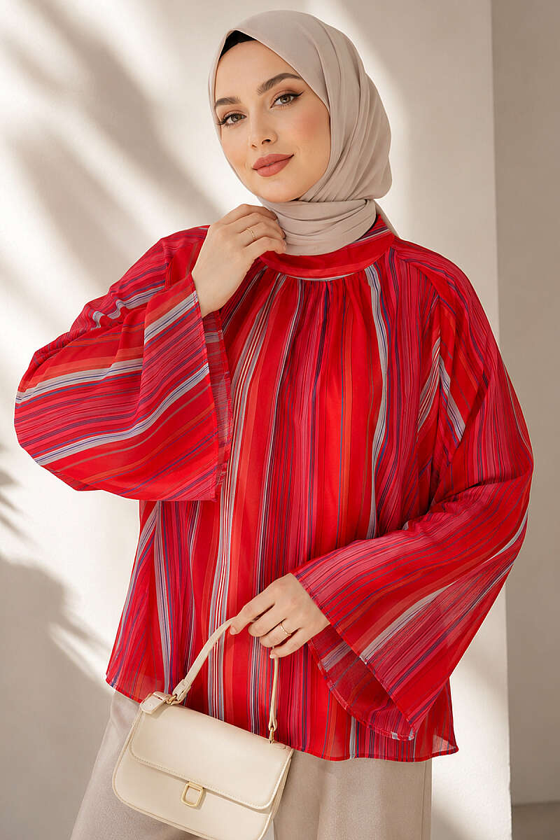https://cdn.pazarium.com.tr/dik-cizgili-genis-kollu-tunik-oranj-801208-19-B.jpg