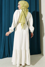 https://cdn.pazarium.com.tr/dik-yaka-buzgulu-elbise-ekru-816187-20-B.jpg
