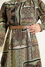https://cdn.pazarium.com.tr/dik-yaka-kol-gipeli-desenli-tunik-yesil-816592-20-B.jpg