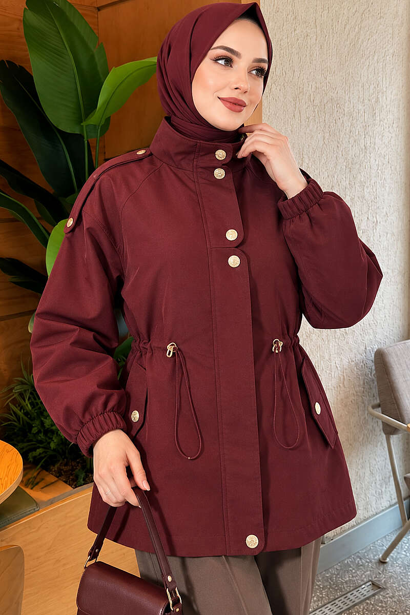 https://cdn.pazarium.com.tr/dugme-detayli-bel-tunelli-trenckot-murdum-829012-20-B.jpg
