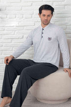 https://cdn.pazarium.com.tr/dugmeli-armali-erkek-pijama-takimi-gri-583584-13-B.jpg