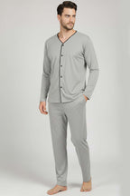https://cdn.pazarium.com.tr/dugmeli-buyuk-beden-interlok-erkek-pijama-takim-gri-680656-16-B.jpg