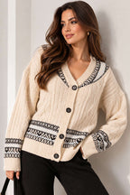 https://cdn.pazarium.com.tr/dugmeli-orgu-motifli-triko-hirka-mavi-826699-20-B.jpg