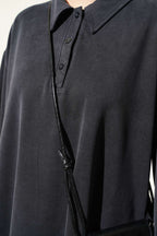 https://cdn.pazarium.com.tr/dugmeli-yaka-tensel-ikili-takim-siyah-821315-20-B.jpg