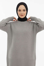 https://cdn.pazarium.com.tr/dusuk-omuz-detayli-triko-tunik-gri-688788-16-B.jpg