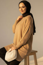 https://cdn.pazarium.com.tr/dusuk-omuz-detayli-triko-tunik-latte-683091-16-B.jpg