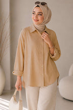 https://cdn.pazarium.com.tr/dusuk-omuzlu-salas-gomlek-camel-805102-19-B.jpg