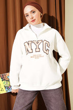 https://cdn.pazarium.com.tr/fermuarli-nyc-nakisli-sweatshirt-ekru-823067-20-B.jpg