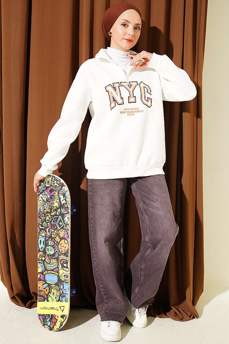 https://cdn.pazarium.com.tr/fermuarli-nyc-nakisli-sweatshirt-ekru-823068-20-B.jpg