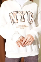 https://cdn.pazarium.com.tr/fermuarli-nyc-nakisli-sweatshirt-ekru-823070-20-B.jpg
