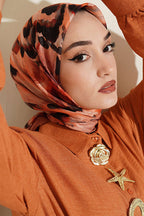 https://cdn.pazarium.com.tr/firca-desenli-soft-esarp-camel-814060-20-B.jpg