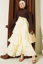 https://cdn.pazarium.com.tr/firfirli-bel-lastik-detayli-sifon-etek-sari-808482-20-B.jpg