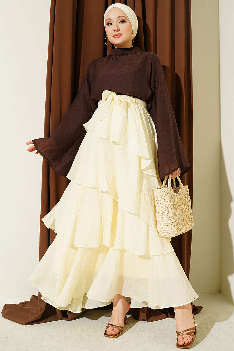 https://cdn.pazarium.com.tr/firfirli-bel-lastik-detayli-sifon-etek-sari-808482-20-B.jpg