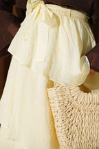 https://cdn.pazarium.com.tr/firfirli-bel-lastik-detayli-sifon-etek-sari-808483-20-B.jpg