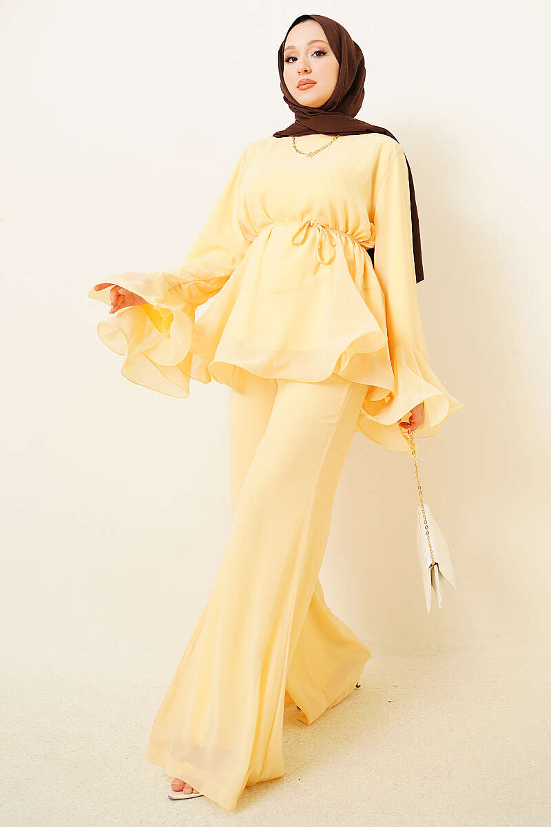 https://cdn.pazarium.com.tr/firfirli-sifon-tunik-ikili-takim-sari-803327-19-B.jpg