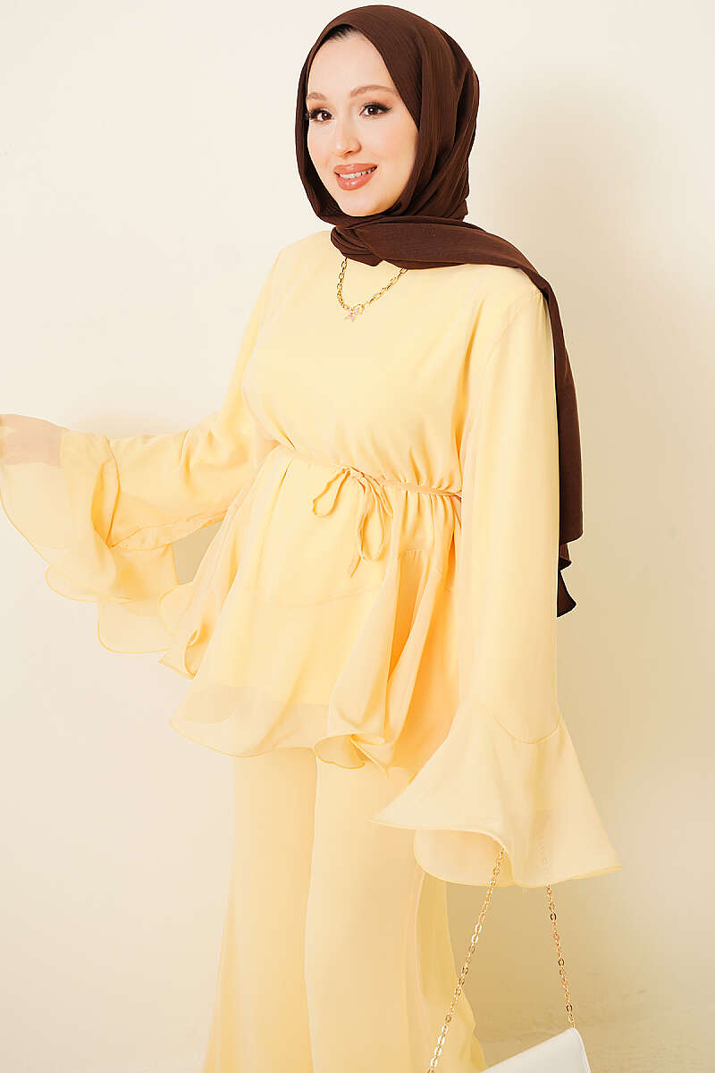 https://cdn.pazarium.com.tr/firfirli-sifon-tunik-ikili-takim-sari-803329-19-B.jpg