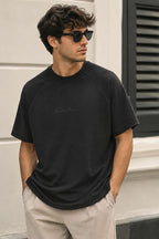 https://cdn.pazarium.com.tr/fitilli-enjeksiyon-baskili-erkek-t-shirt-siyah-786086-19-B.jpg