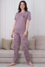 https://cdn.pazarium.com.tr/fiyonk-desen-dugmeli-pijama-takim-leylak-610326-14-B.jpg