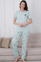 https://cdn.pazarium.com.tr/fiyonk-desen-dugmeli-pijama-takim-mint-610322-14-B.jpg