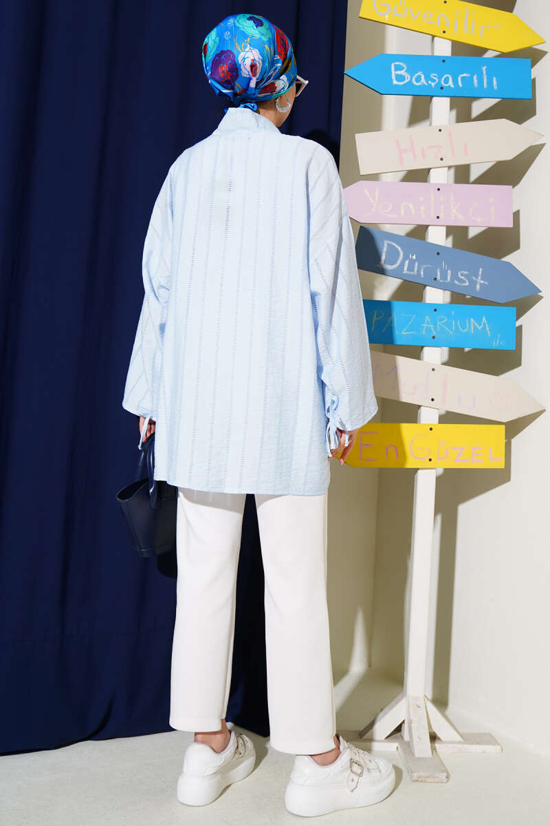 https://cdn.pazarium.com.tr/fiyonk-detayli-dugmeli-kimono-mavi-665911-16-B.jpg
