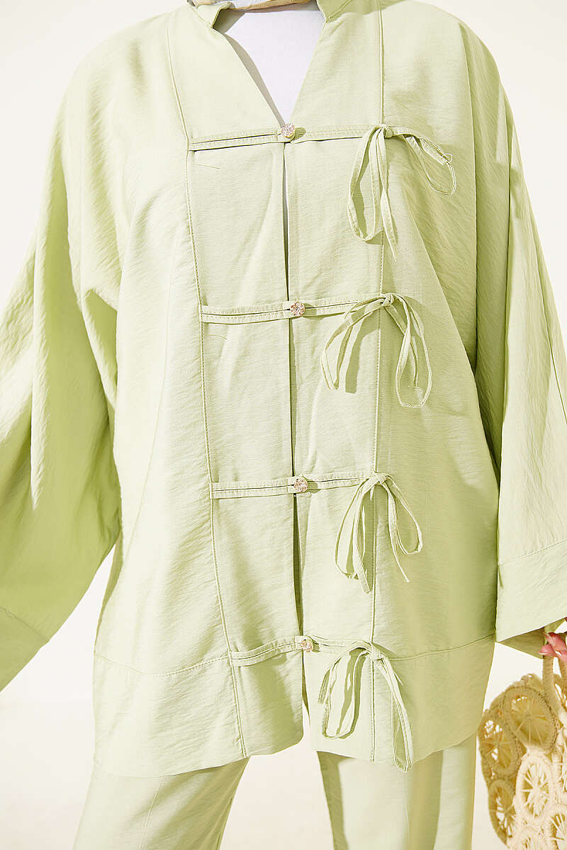 https://cdn.pazarium.com.tr/fiyonk-detayli-kimono-ikili-takim-cagla-yesili-805327-19-B.jpg