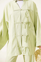 https://cdn.pazarium.com.tr/fiyonk-detayli-kimono-ikili-takim-cagla-yesili-805327-19-B.jpg