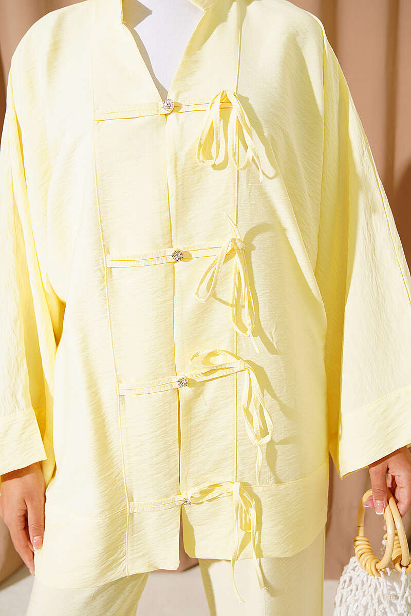 https://cdn.pazarium.com.tr/fiyonk-detayli-kimono-ikili-takim-sari-805315-19-B.jpg