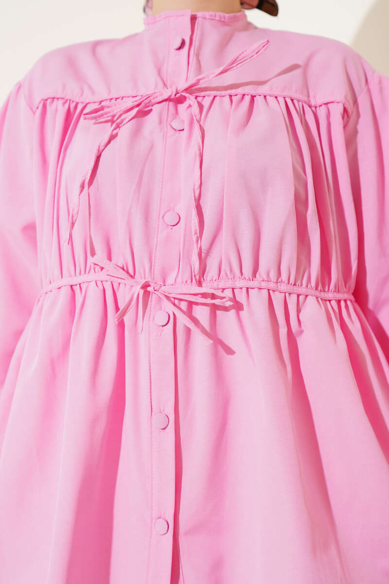 https://cdn.pazarium.com.tr/fiyonklu-buzgulu-gomlek-pembe-650555-15-B.jpg