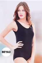 https://cdn.pazarium.com.tr/genis-askili-bayan-citcitli-body-beyaz-471337-11-B.jpg