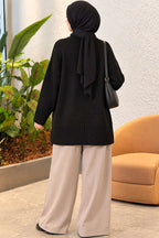 https://cdn.pazarium.com.tr/genis-kol-ribanali-triko-tunik-siyah-824634-20-B.jpg