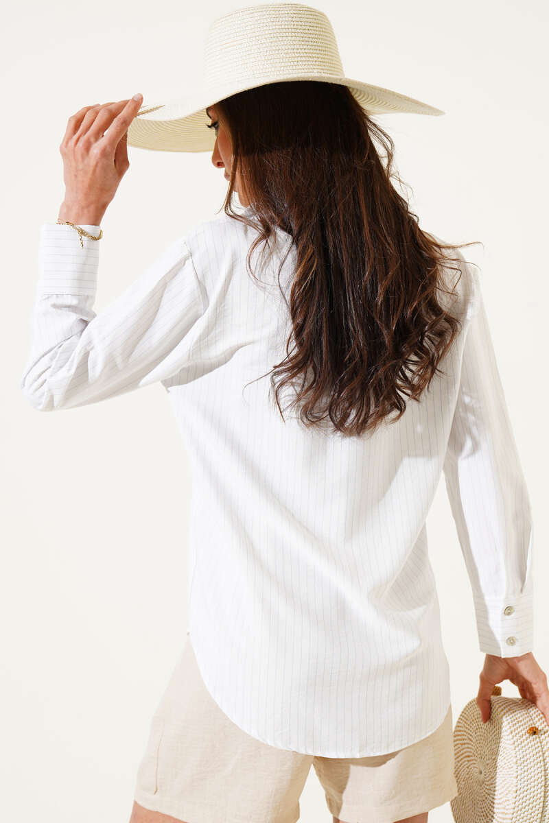 https://cdn.pazarium.com.tr/genis-mansetli-ince-cizgili-gomlek-mavi-596639-14-B.jpg