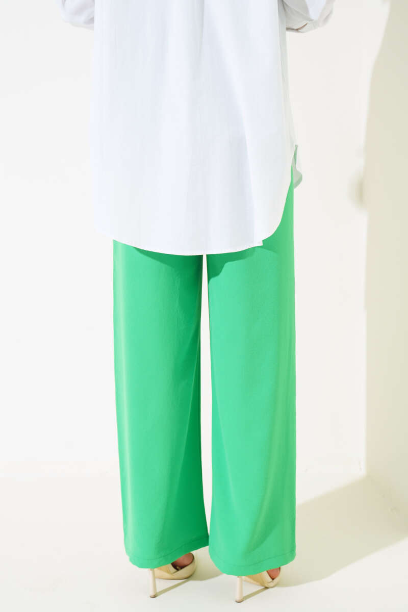 https://cdn.pazarium.com.tr/genis-paca-beli-lastikli-pantolon-benetton-531763-12-B.jpg