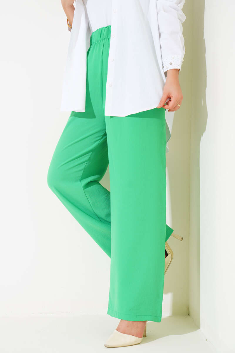 https://cdn.pazarium.com.tr/genis-paca-beli-lastikli-pantolon-benetton-531764-12-B.jpg