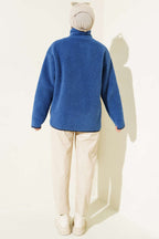 https://cdn.pazarium.com.tr/gogus-cepli-pelus-hirka-indigo-570383-13-B.jpg