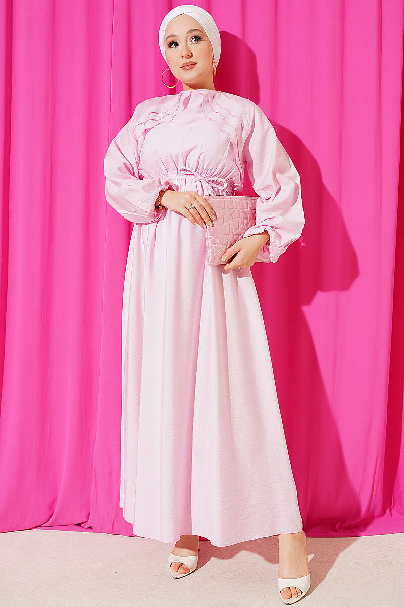 https://cdn.pazarium.com.tr/gogus-firfir-detayli-ip-kusakli-elbise-pembe-807613-19-B.jpg