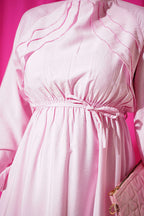 https://cdn.pazarium.com.tr/gogus-firfir-detayli-ip-kusakli-elbise-pembe-807618-19-B.jpg