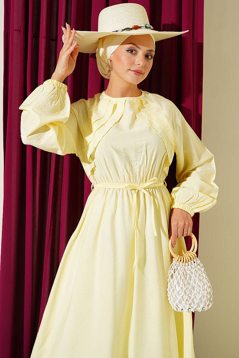 https://cdn.pazarium.com.tr/gogus-firfir-detayli-ip-kusakli-elbise-sari-807406-19-B.jpg