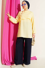 https://cdn.pazarium.com.tr/gold-aksesuarli-yan-baglamali-tunik-sari-811488-20-B.jpg