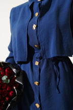 https://cdn.pazarium.com.tr/gold-dugmeli-bolerolu-tencel-ikili-takim-indigo-637780-15-B.jpg